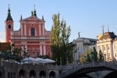 Image of Ljubljana taken from a boat in the river.