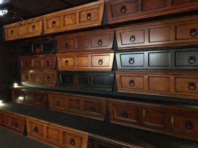 Image of seats that look like coffins.