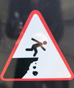 Image of someone falling off a cliff.