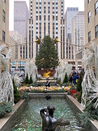 Image of angels and the Rockefeller Christmas Center Christmas Tree