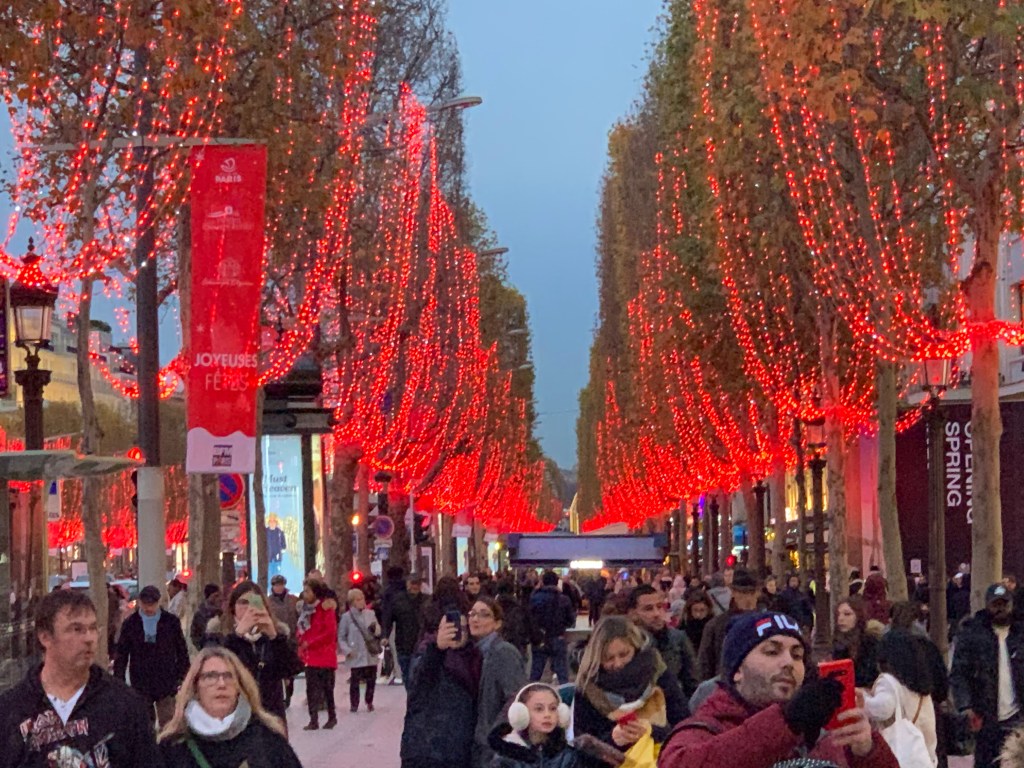 Image of the trees lit up along the Champs-Élysées.