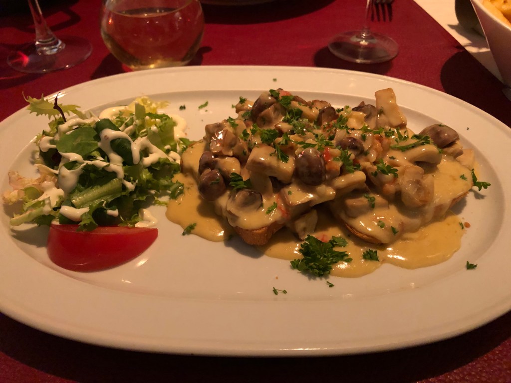 Image of mushrooms on toast.